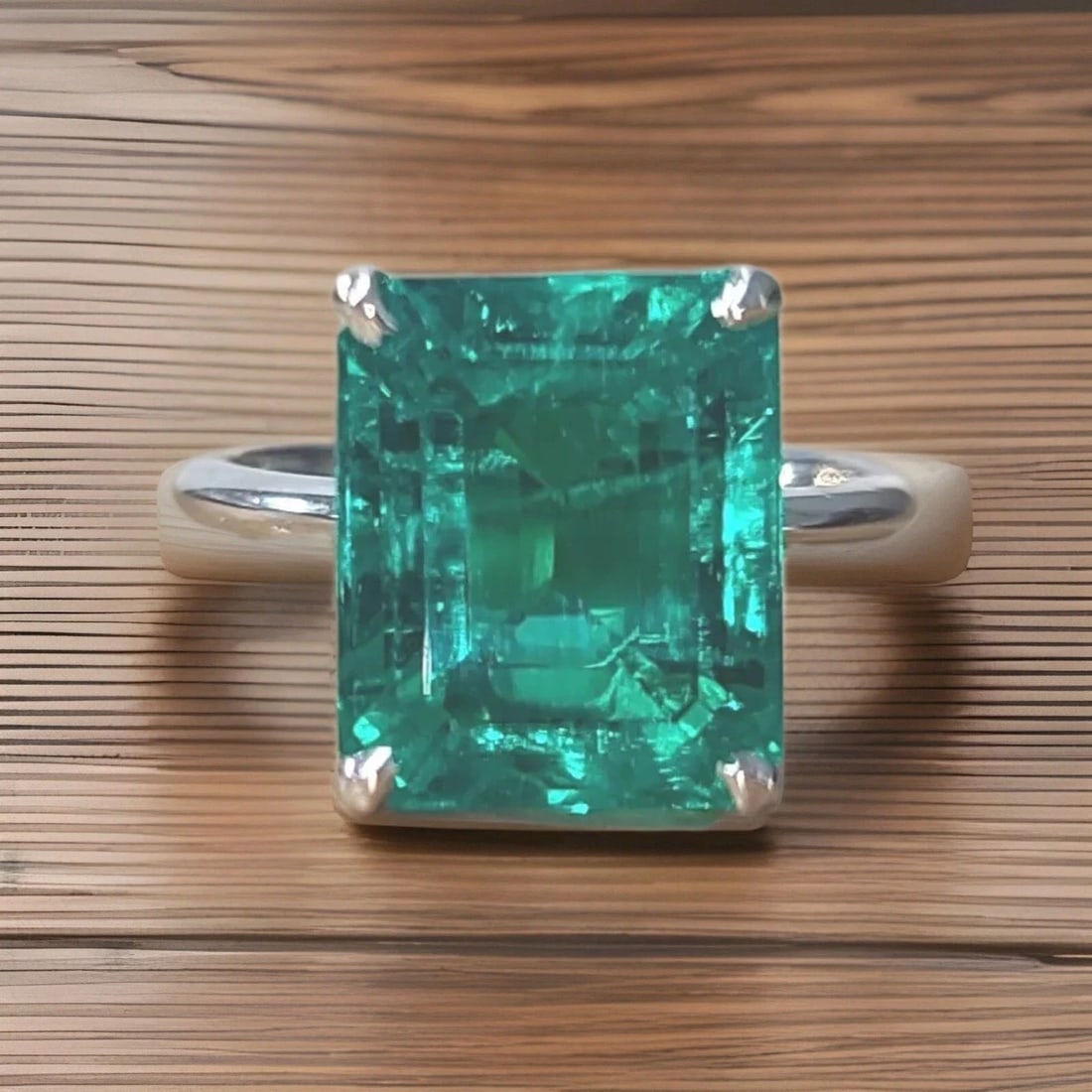 VINTAGE 14K WHITE GOLD ENGAGEMENT RING 6.31CT.LAB GROWN GREEN EMERALD CUT: VINTAGE 14K WHITE GOLD ENGAGEMENT RING 6.31CT. GREEN EMERALD RECTANGULAR SHAPE Vintage 14K white Gold Engagement green emerald ring. CENTER SET lab-grown EMERALD IN RECTANGULAR SHAPE. WEIGHT 6.31CARAT