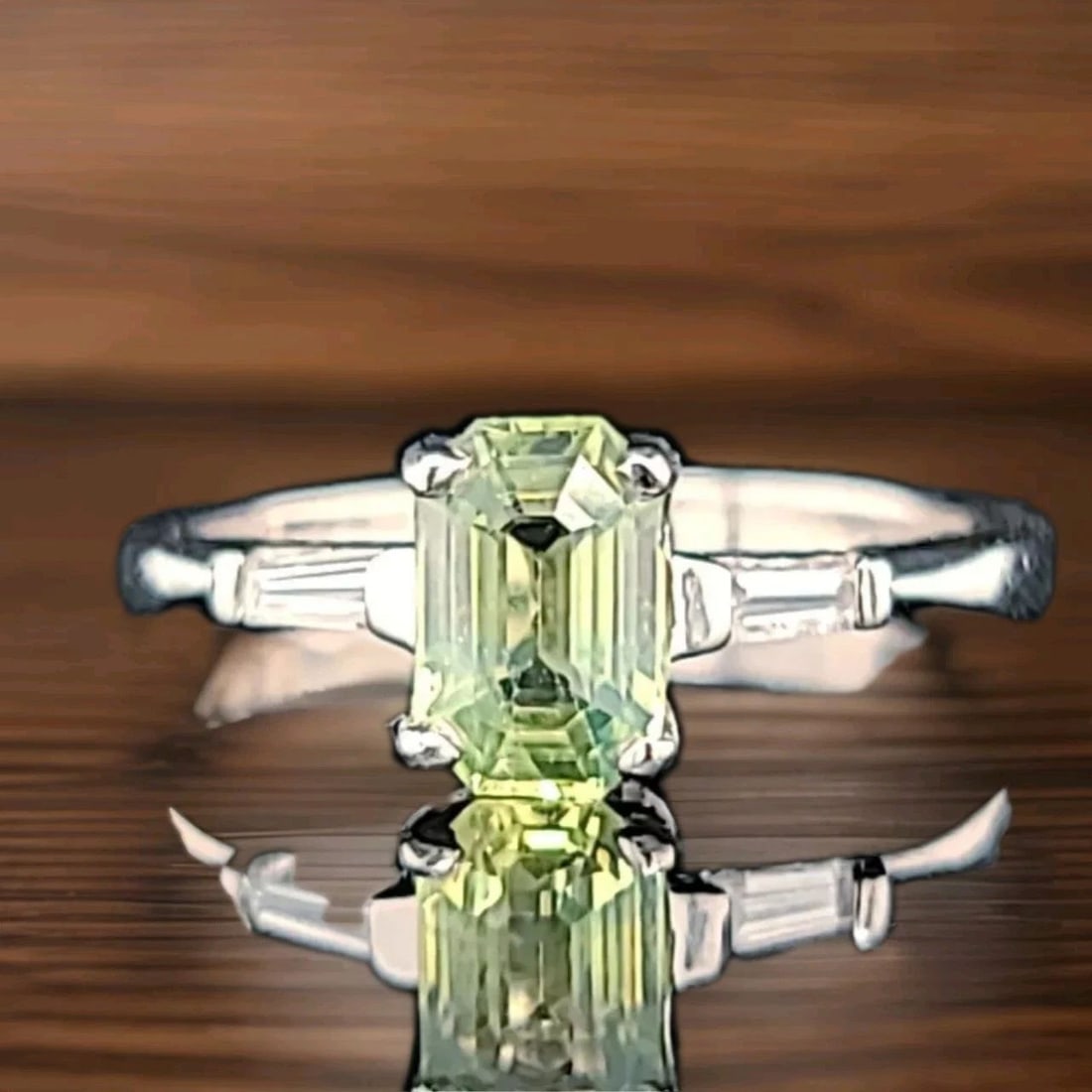 PLATINUM VINTAGE ENGAGEMENT RING 1.46CT.NATURAL GREEN SAPPHIRE EMERALD SHAPE GIA: 1.46CT PLATINUM VINTAGE ENGAGEMENT RING NATURAL GREEN SAPPHIRE EMERALD SHAPE Gorgeous Vintage Platinum Engagement ring circ 1940's center natural green sapphire in emerald shape weight 1.46ct. SIZE 7.