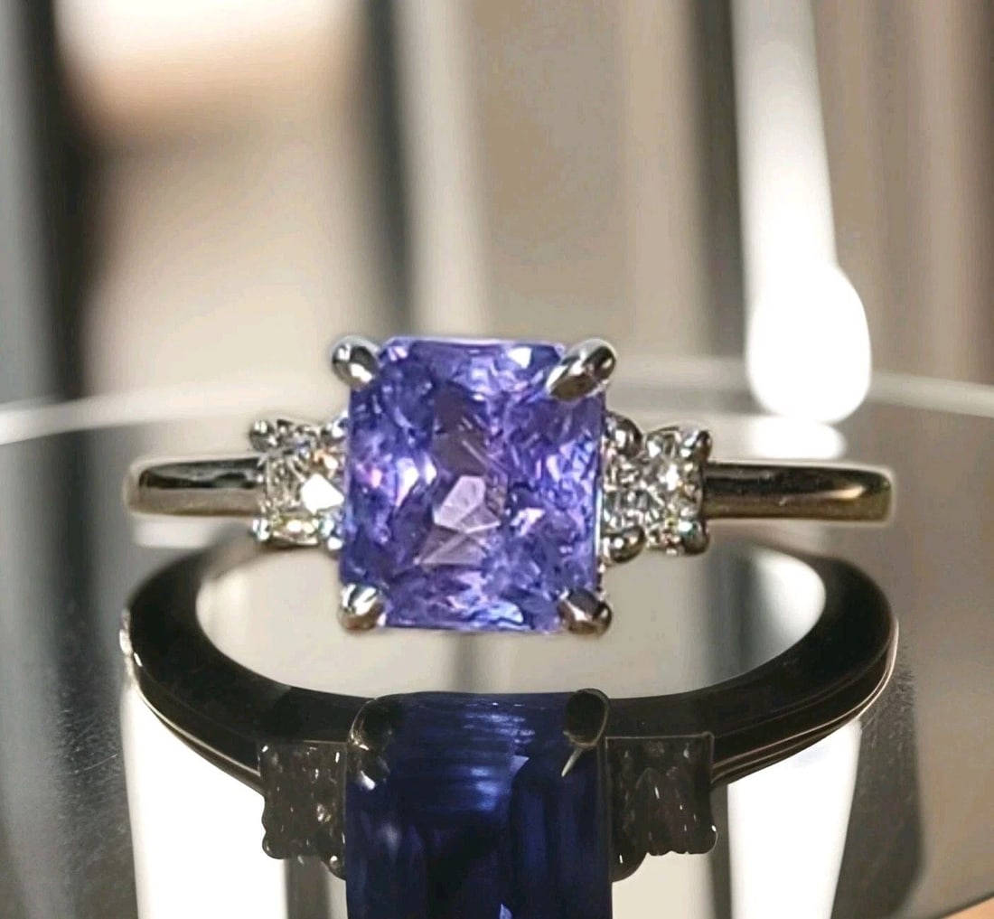 VINTAGE 14K WHITE GOLD ENGAGEMENT RING 2.05CT.NATURAL BLUE VIOLET SAPPHIRE: VINTAGE 14K WHITE GOLD ENGAGEMENT RING 2.05CT.NATURAL BLUE VIOLET SAPPHIRE This gorgeous vintage 14K White Gold Engagement ring features a beautiful 2.05ct natural blue-violet sapphire as the main sto