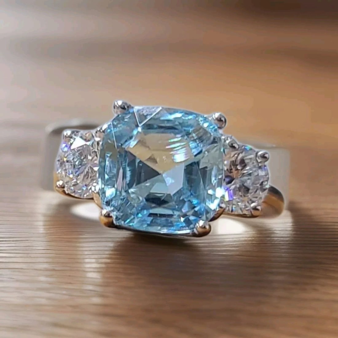 14K WHITE GOLD ENGAGEMENT RING 3.10CT.NATURAL SKY BLUE AQUAMARINE CUSHION SHAPE: 14K WHITE GOLD ENGAGEMENT RING 3.10CT.NATURAL SKY BLUE AQUAMARINE CUSHION SHAPE This beautiful 14k white gold engagement ring features a stunning 3.10 carat natural sky blue aquamarine in a cushion sh