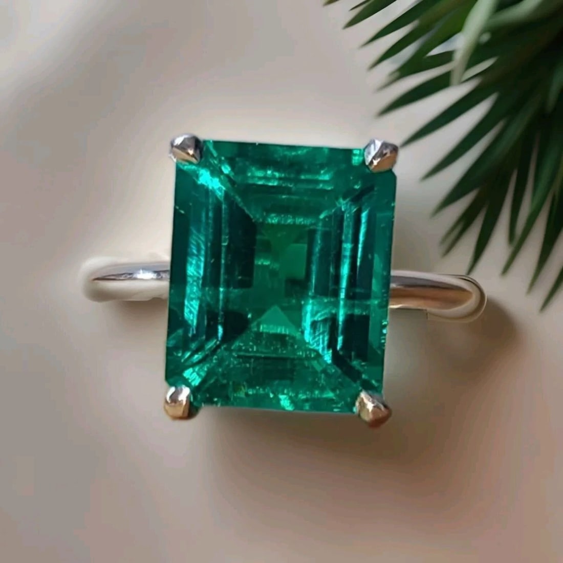VINTAGE 14K WHITE GOLD ENGAGEMENT RING 5.54CT.LAB GROWN GREEN EMERALD SHAPE: VINTAGE 14K WHITE GOLD ENGAGEMENT RING 5.54CT.GEM GREEN EMERALD This stunning 14k white gold ring features a breathtaking 5.54ct. Green Emerald in an emerald cut. The ring is perfect for any occasion.
