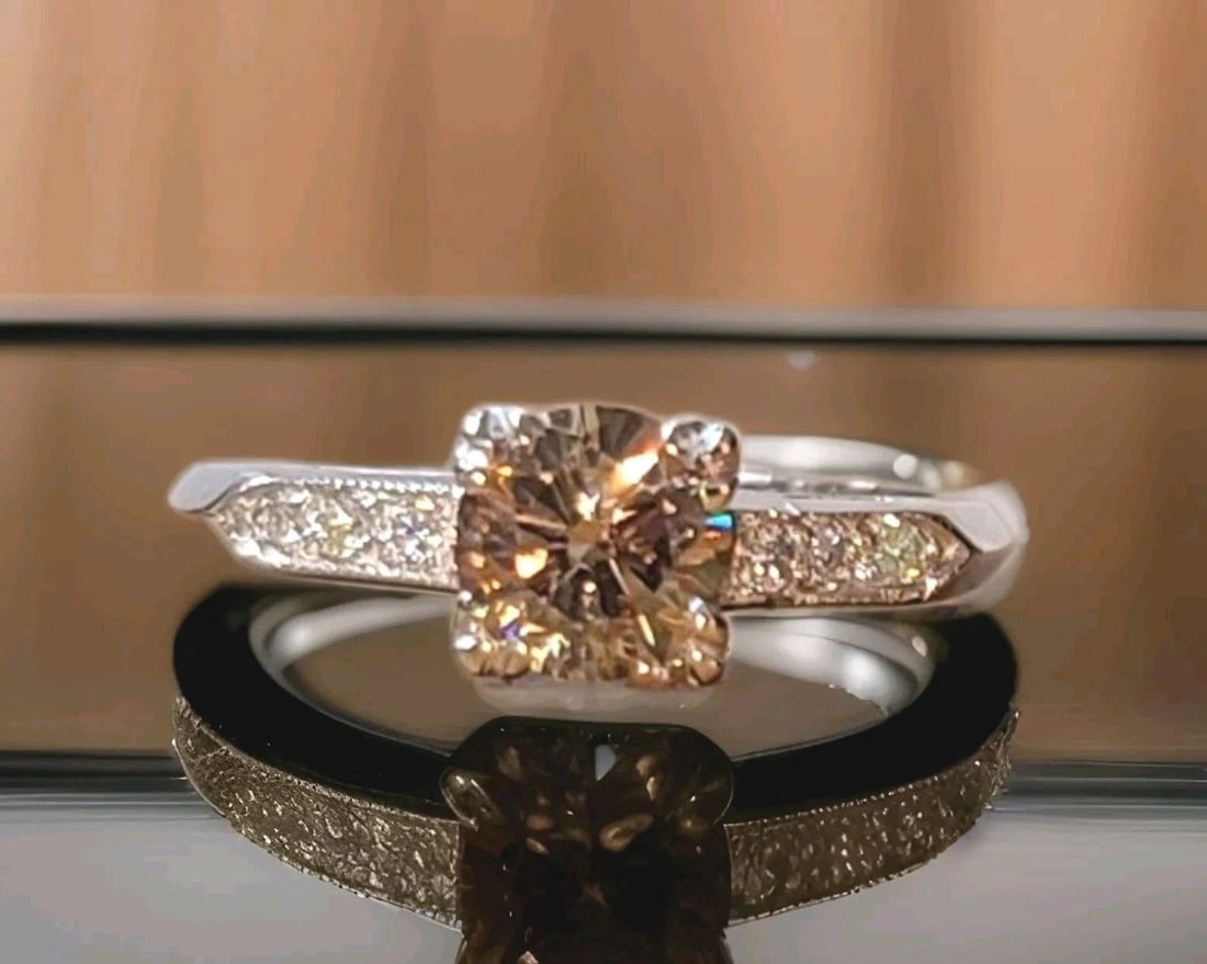 VINTAGE PLATINUM ENGAGEMENT RING 0.71CT.NATURAL CHAMPAGNE ROUND CUT DIAMOND GIA: VINTAGE PLATINUM ENGAGEMENT RING 0.78CT.NATURAL EURO CUT ROUND DIAMOND Vintage platinum euro round cut diamond engagement RING CENTER natural euro round cut diamond WEIGHT 0.78CT SIZE 5.5mm SI2-H- col