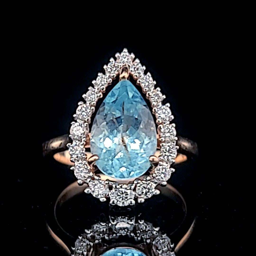 14K ROSE GOLD ENGAGEMENT RING 2.18.CT. NATURAL SKY BLUE AQUAMARINE PEAR SHAPE: 14K ROSE GOLD ENGAGEMENT RING 2.18.CT. NATURAL SKY BLUE AQUAMARINE PEAR SHAPE STUNNING 14K ROSE GOLD ENGAGEMENT RING. NATURAL GEM SKY BLUE AQUAMARINE IN PEAR SHAPE CENTER 2.18CARAT NATURAL AQUAMARINE