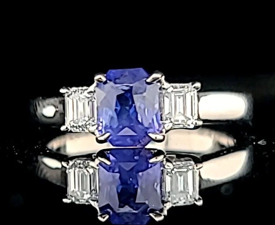 14K WHITE GOLD ENGAGEMENT RING 1.34CT. NATURAL UNTREATED BLUE SAPPHIRE RADIANT: 14K WHITE GOLD ENGAGEMENT RING 1.34CT. NATURAL UNTREATED BLUE SAPPHIRE RADIANT GORGEOUS 14K WHITE GOLD engagement ring natural blue Ceylon sapphire in radiant shape, center weight 1.34carat. size 6.2x