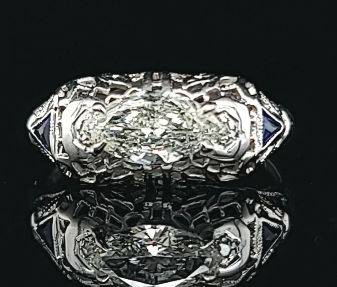 18K WHITE GOLD VINTAGE 0.73CT NATURAL MARQUISE DIAMOND EMERALD ENGAGEMENT RING: 18K WHITE GOLD VINTAGE 0.73CT NATURAL MARQUISE DIAMOND EMERALD ENGAGEMENT RING Stunning Vintage Art Deco filigree marquise CUT natural Diamond 18k white gold engagement ring circ 1910's center natural