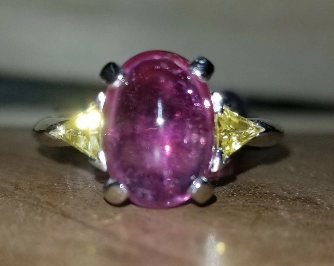 18K WHITE GOLD ENGAGEMENT RING 4.07CT. NATURAL PINK TOURMALINE YELLOW SAPPHIRE: 18K WHITE GOLD ENGAGEMENT RING 4.07CT. NATURAL PINK TOURMALINE YELLOW SAPPHIRE GORGEOUS 18K white gold natural tourmaline ring center natural tourmaline pink color in cabochon oval shape weight 4.07ct