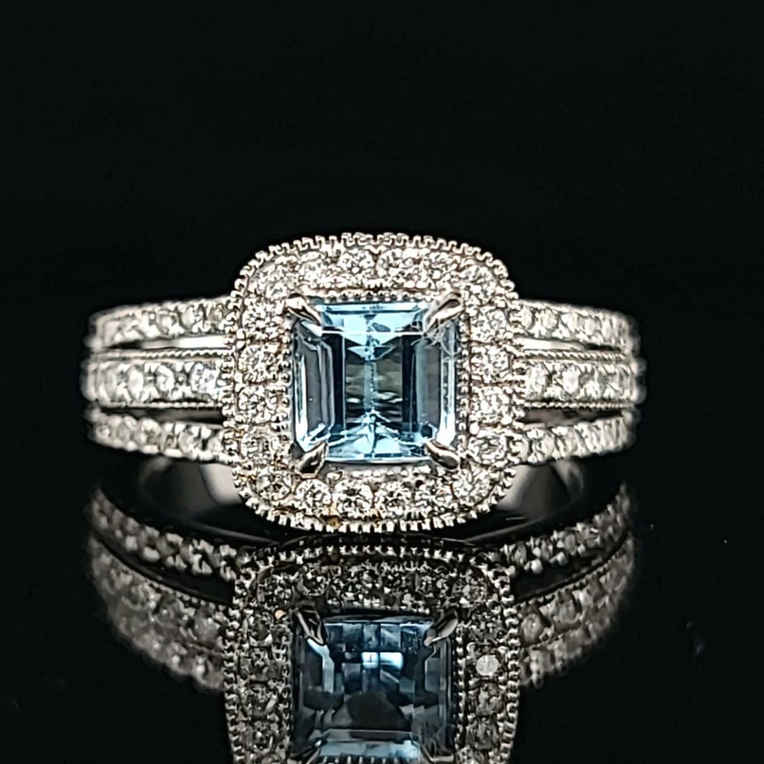 14K WHITE GOLD ENGAGEMENT RING 0.84CT. NATURAL BLUE AQUAMARINE EMERALD SHAPE: 14K WHITE GOLD ENGAGEMENT RING 0.84CT. NATURAL BLUE AQUAMARINE EMERALD SHAPE Gorgeous 14k white gold ring natural aquamarine emerald shape Center natural aquamarine in emerald shape weight 0.84ct. siz