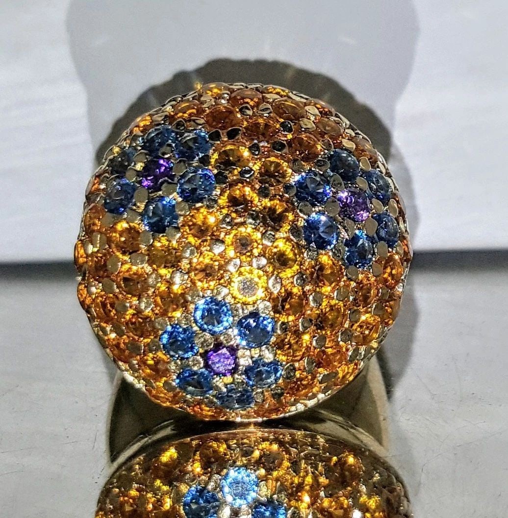 14K YELLOW GOLD RING 5.75CT. NATURAL SAPPHIRE ROUND SHAPE: 14K YELLOW GOLD RING 5.75CT. NATURAL SAPPHIRE ROUND SHAPE Gorgeous 14k yellow gold ring natural yellow and blue sapphire Round shape total weight 5.75ct. Very Nice color nice luster very lively , bril