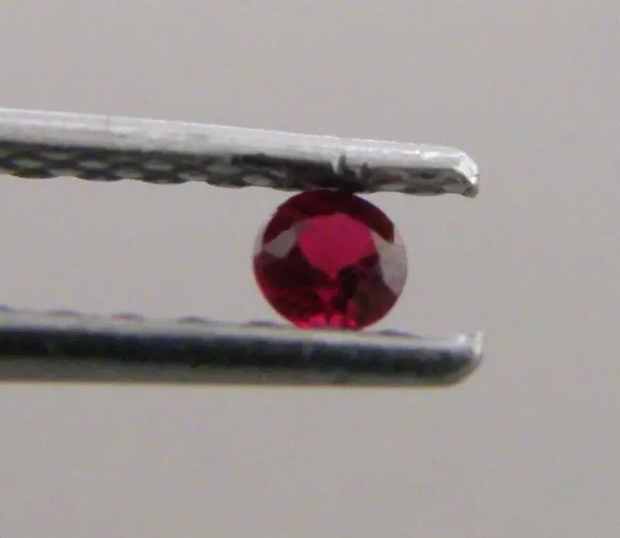 LOOSE NATURAL TOP COLOR RUBY Sale is for 1 round cut natural pigeon blood ruby Ruby measures 2.4mm (1 of 2)