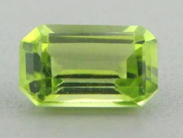 LOOSE NATURAL EMERALD CUT GREEN PERIDOT Sale is for 1 Emerald cut Peridot Peridot measures 10x8mm (1 of 2)