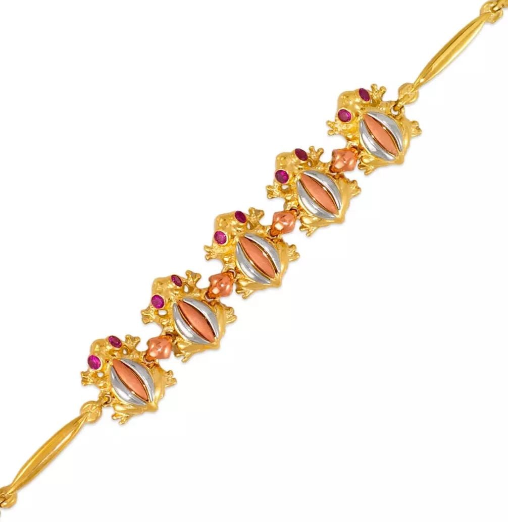 NEW 14K TRI COLOR GOLD FANCY FROG CZ BRACELET 14K Tricolor Gold Approx. 2mm Wide, 10mm Center High: NEW 14K TRI COLOR GOLD FANCY FROG CZ BRACELET 14K Tricolor Gold Approx. 2mm Wide, 10mm Center High Polished/Satin Finished/Cubic Zirconia Length : 7" Inch Weight: 9.0 Grams