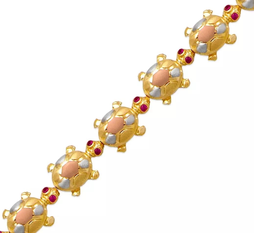 NEW 14K TRI COLOR GOLD TURTLE CZ BRACELET 14K Tricolor Gold Approx. 10mm Wide High Polished/Satin: NEW 14K TRI COLOR GOLD TURTLE CZ BRACELET 14K Tricolor Gold Approx. 10mm Wide High Polished/Satin Finished/Cubic Zirconia Items in this Set: Pendant, Ring Length : 7" Inch Weight: 18.2 Grams