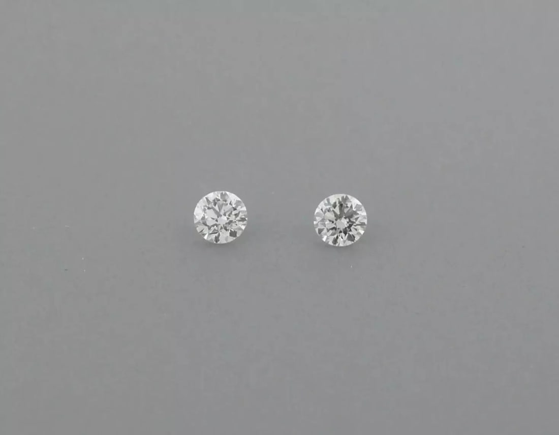 LOOSE NATURAL UNTREATED DIAMONDS Sale is for 2 round cut natural untreated earth mined diamond Sale: LOOSE NATURAL UNTREATED DIAMONDS Sale is for 2 round cut natural untreated earth mined diamond Sale is for a matching pair Diamonds measures 1.3mm in diameter Diamonds are full cut Diamonds are G colo