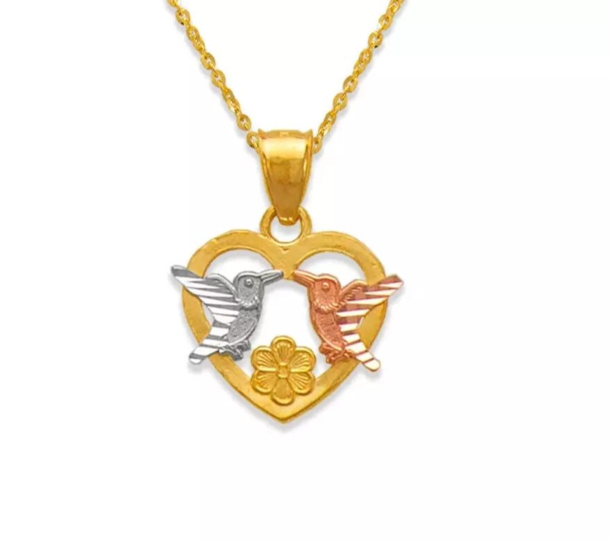 NEW 14K TRICOLOR GOLD TWO DOVES IN A HEART PENDANT: NEW 14K TRICOLOR GOLD TWO DOVES IN A HEART PENDANT 14K Tricolor Gold Approx. 14x12mm High Polished/Diamond Cut Chains Sold Separately Weight: 1.2 Grams