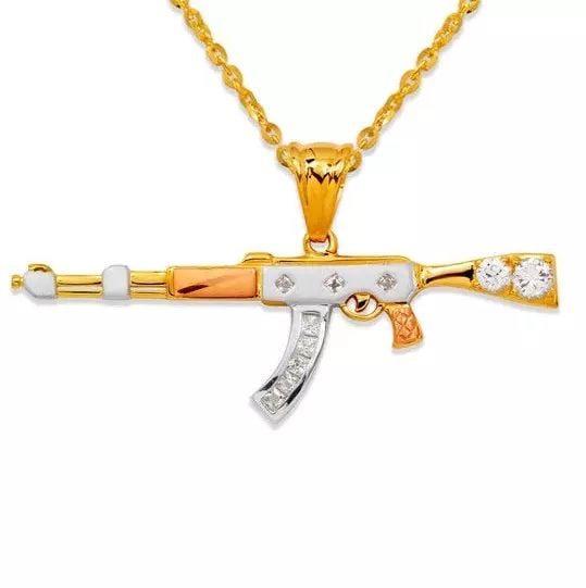 NEW 14K TRICOLOR GOLD FANCY RIFLE CZ PENDANT: NEW 14K TRICOLOR GOLD FANCY RIFLE CZ PENDANT 14K Tricolor Gold Approx. 60x19mm High Polished/Satin Finished/Cubic Zirconia Chains Sold Separately Weight: 5.4 Grams