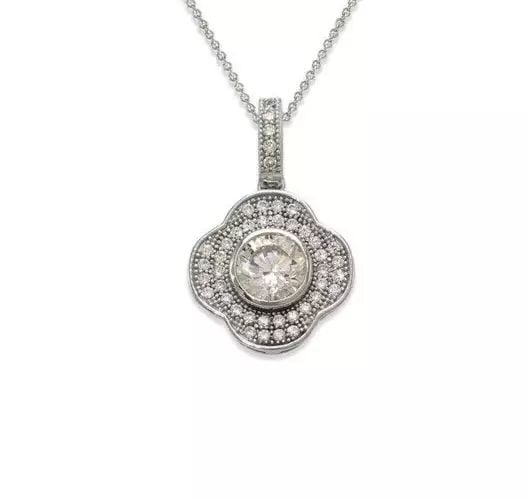 NEW 14K WHITE GOLD FANCY FLOWER CZ PENDANT: NEW 14K WHITE GOLD FANCY FLOWER CZ PENDANT 14K White Gold Approx. 13x13mm Cubic Zirconia Items in this Set: Earrings Available as a Set Available in Yellow Gold Chains Sold Separately Weight: 1.8 Gram