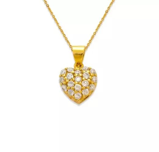 NEW 14K YELLOW GOLD FANCY HEART CZ PENDANT: NEW 14K YELLOW GOLD FANCY HEART CZ PENDANT 14K Yellow Gold Approx. 7x7mm Cubic Zirconia Items in this Set: Earrings Available as a Set Available in White Gold Chains Sold Separately Weight: 0.8 Grams