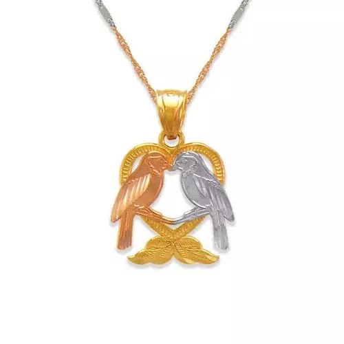 NEW 14K TRICOLOR GOLD TWO DOVES IN A HEART PENDANT: NEW 14K TRICOLOR GOLD TWO DOVES IN A HEART PENDANT 14K Tricolor Gold Approx. 15x15mm High Polished/Diamond Cut Chains Sold Separately Weight: 1.5 Grams