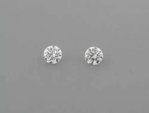 1.9mm MATCHING PAIR BRILLIANT ROUND CUT LOOSE NATURAL UNTREATED DIAMOND G VS2: LOOSE NATURAL UNTREATED DIAMONDS Sale is for 2 round cut natural untreated earth mined diamond Sale is for a matching pair Diamonds measures 1.9mm in diameter Diamonds are full cut Diamonds are G colo
