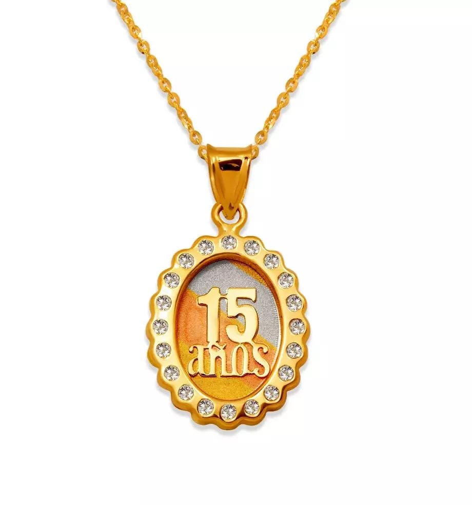 NEW 14K TRICOLOR MINI 15 ANOS CZ PENDANT: NEW 14K TRICOLOR MINI 15 ANOS CZ PENDANT 14K Tricolor Gold Approx. 13x16mm Cubic Zirconia Chains Sold Separately Weight: 1.1 Grams