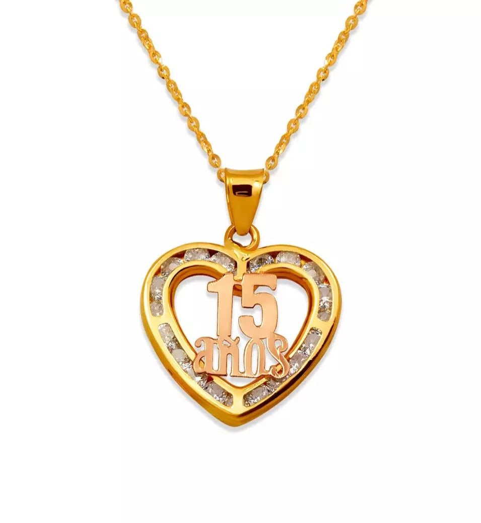 NEW 14K TWO-TONE GOLD 15 ANOS HEART CZ PENDANT: NEW 14K TWO-TONE GOLD 15 ANOS HEART CZ PENDANT 14K Two Tone Gold Approx. 17x17mm Cubic Zirconia Chains Sold Separately Weight: 1.0 Grams