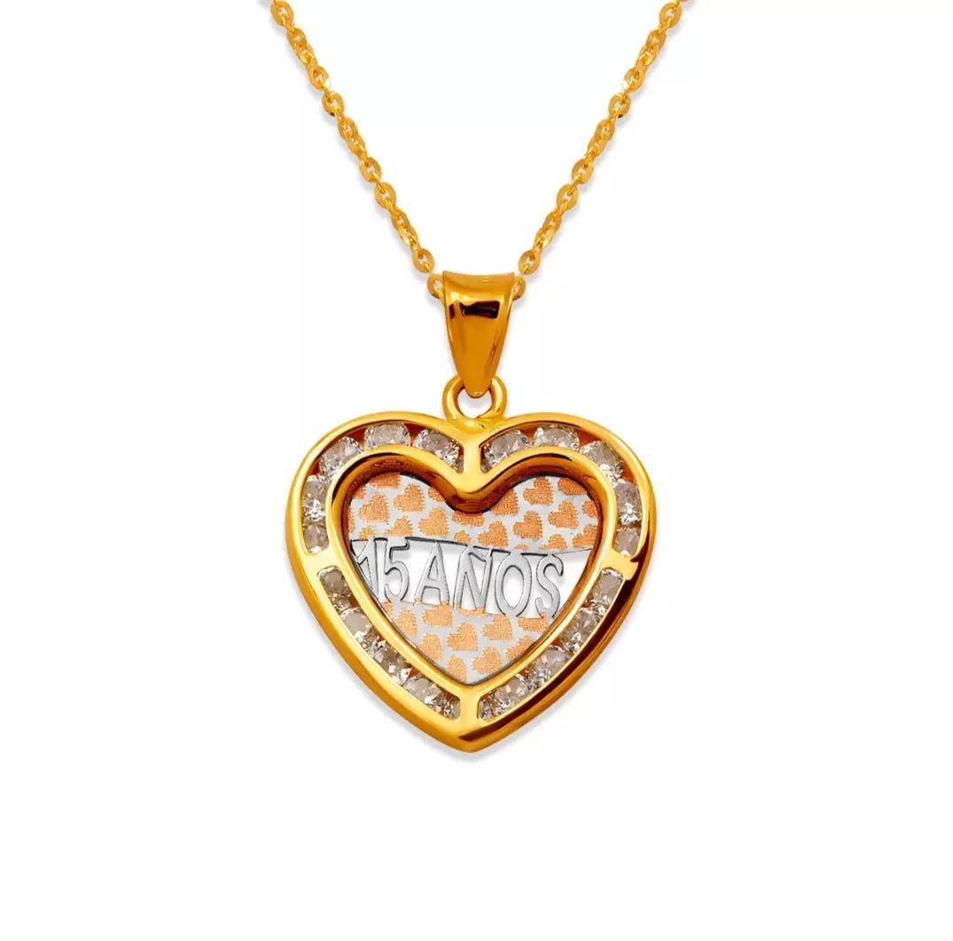NEW 14K TRICOLOR GOLD 15 ANOS HEART CZ PENDANT: NEW 14K TRICOLOR GOLD 15 ANOS HEART CZ PENDANT 14K Tricolor Gold Approx. 17x17mm Cubic Zirconia Chains Sold Separately Weight: 1.1 Grams