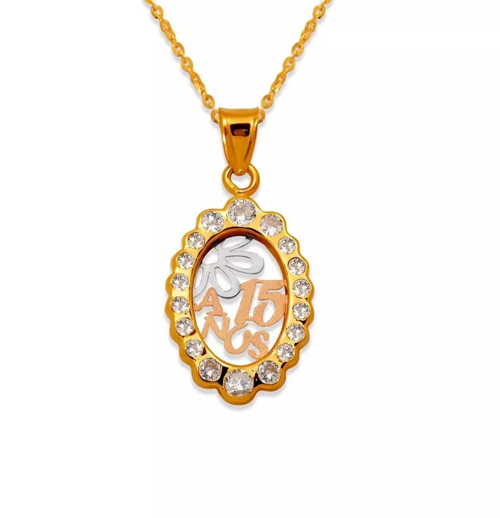 NEW 14K TRICOLOR 15 ANOS CZ PENDANT: NEW 14K YELLOW GOLD FANCY HEART CZ PENDANT 14K Yellow Gold Approx. 20x6mm High Polished/Cubic Zirconia Chains Sold Separately Weight: 0.9 Grams