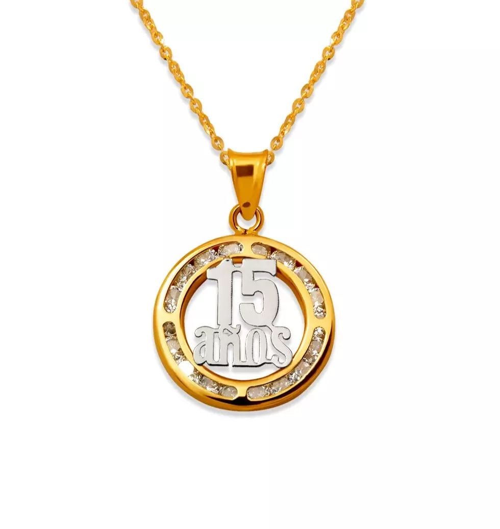 NEW 14K TWO-TONE GOLD 15 ANOS CZ PENDANT: NEW 14K TWO-TONE GOLD 15 ANOS CZ PENDANT 14K Two Tone Gold Approx. 15mm Cubic Zirconia Chains Sold Separately Weight: 0.7 Grams