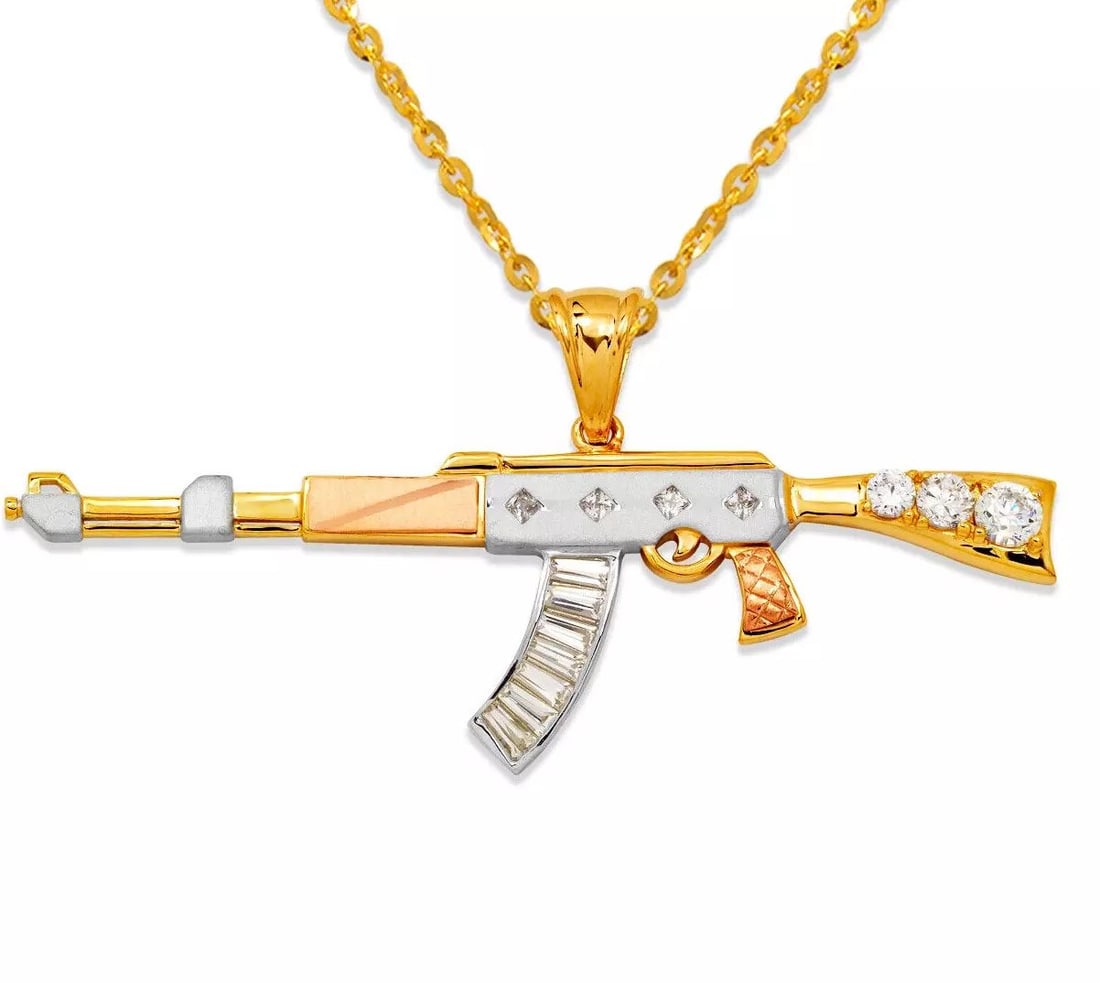 NEW 14K TRICOLOR GOLD FANCY RIFLE CZ PENDANT: NEW 14K TRICOLOR GOLD FANCY RIFLE CZ PENDANT 14K Tricolor Gold Approx. 84x26mm High Polished/Satin Finished/Cubic Zirconia Chains Sold Separately Weight: 11.1 Grams