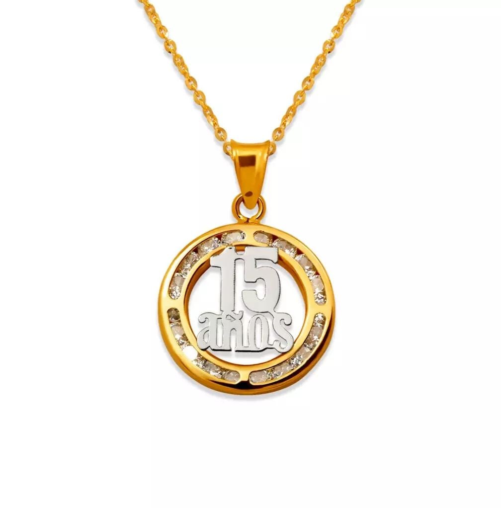 NEW 14K TWO-TONE GOLD 15 ANOS CZ PENDANT: NEW 14K TWO-TONE GOLD 15 ANOS CZ PENDANT 14K Two Tone Gold Approx. 15mm Cubic Zirconia Chains Sold Separately Weight: 0.7 Grams