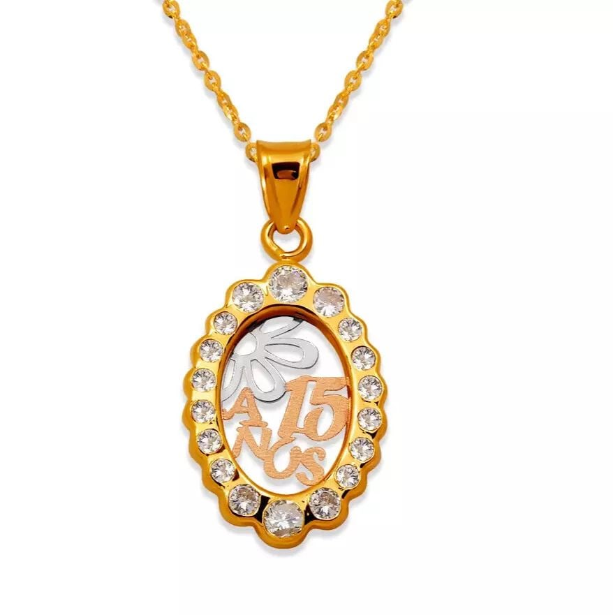 NEW 14K TRICOLOR GOLD 15 ANOS CZ PENDANT: NEW 14K TRICOLOR GOLD 15 ANOS CZ PENDANT 14K Tricolor Gold Approx. 13x18mm Cubic Zirconia Chains Sold Separately Weight: 0.8 Grams
