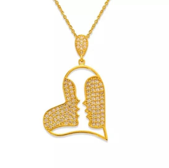 NEW 14K YELLOW GOLD FANCY HEART WITH KISS CZ PENDANT: NEW 14K YELLOW GOLD FANCY HEART WITH KISS CZ PENDANT 14K Yellow Gold Approx. 21x25mm High Polished/Cubic Zirconia Chains Sold Separately Weight: 2.5 Grams