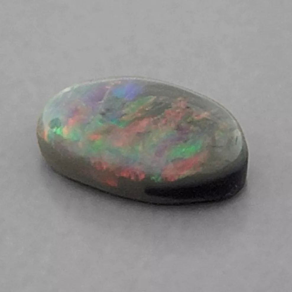 1.08ct LOOSE OVAL CABOCHON NATURAL BLACK OPAL AUSTRALIA (1 of 2)