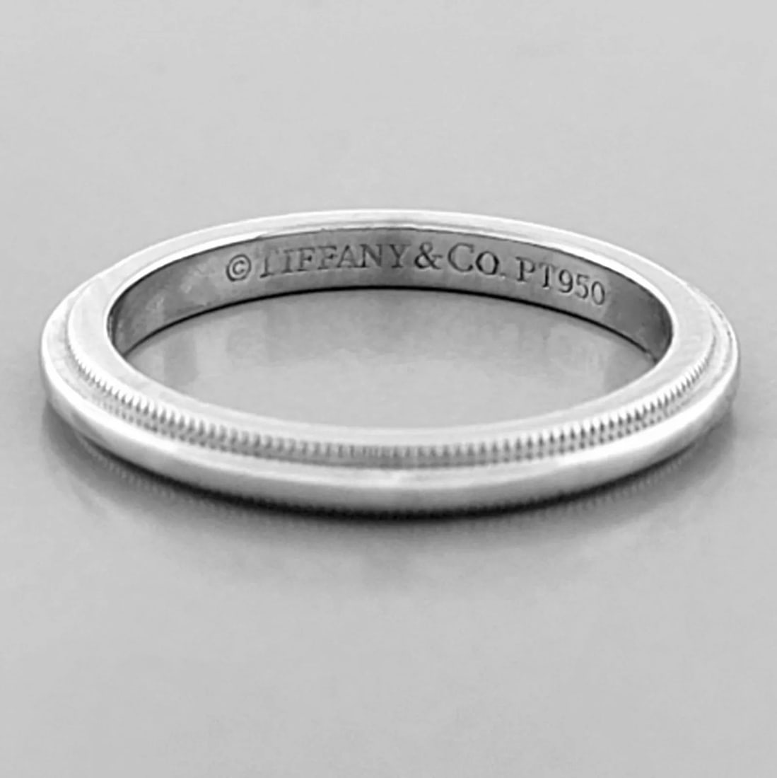 TIFFANY & Co. 2mm TOGETHER MILGRAIN PLATINUM WEDDING BAND RING SIZE 3.5: TIFFANY & Co. TOGETHER WEDDING BAND RING Ring size is a 3.5 Ring measures 2mm wide 1.8mm Thick/High Tiffany & Co. Together platinum 2mm milgrain wedding band Pre-owned in Excellent condition, please r