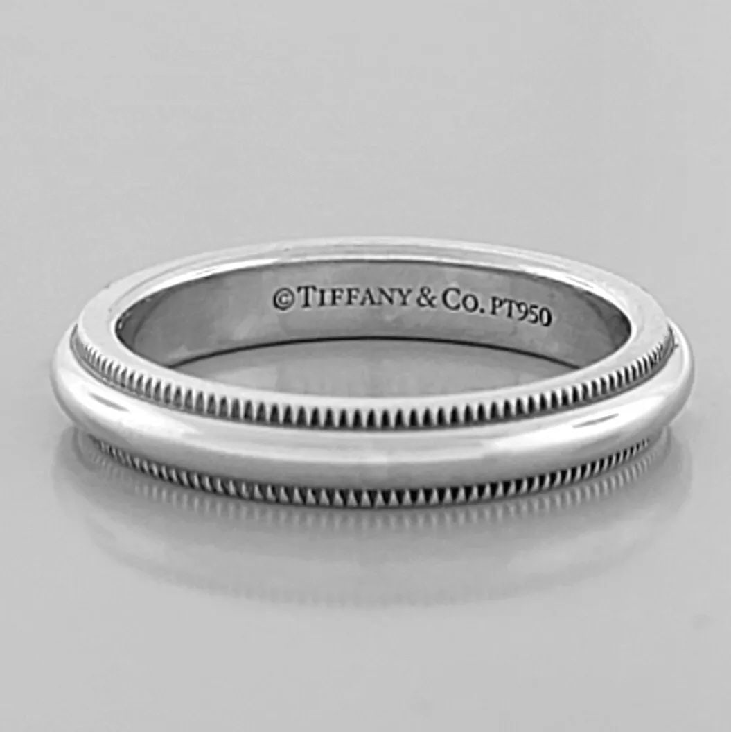 TIFFANY & Co. 3mm TOGETHER MILGRAIN PLATINUM WEDDING BAND RING SIZE 4.5: TIFFANY & Co. TOGETHER WEDDING BAND RING SIZE 4.5 Ring size is a 4.5 Ring measures 3mm wide 2mm Thick/High Tiffany & Co. Together platinum 3mm milgrain wedding band Pre-owned in Excellent condition, p