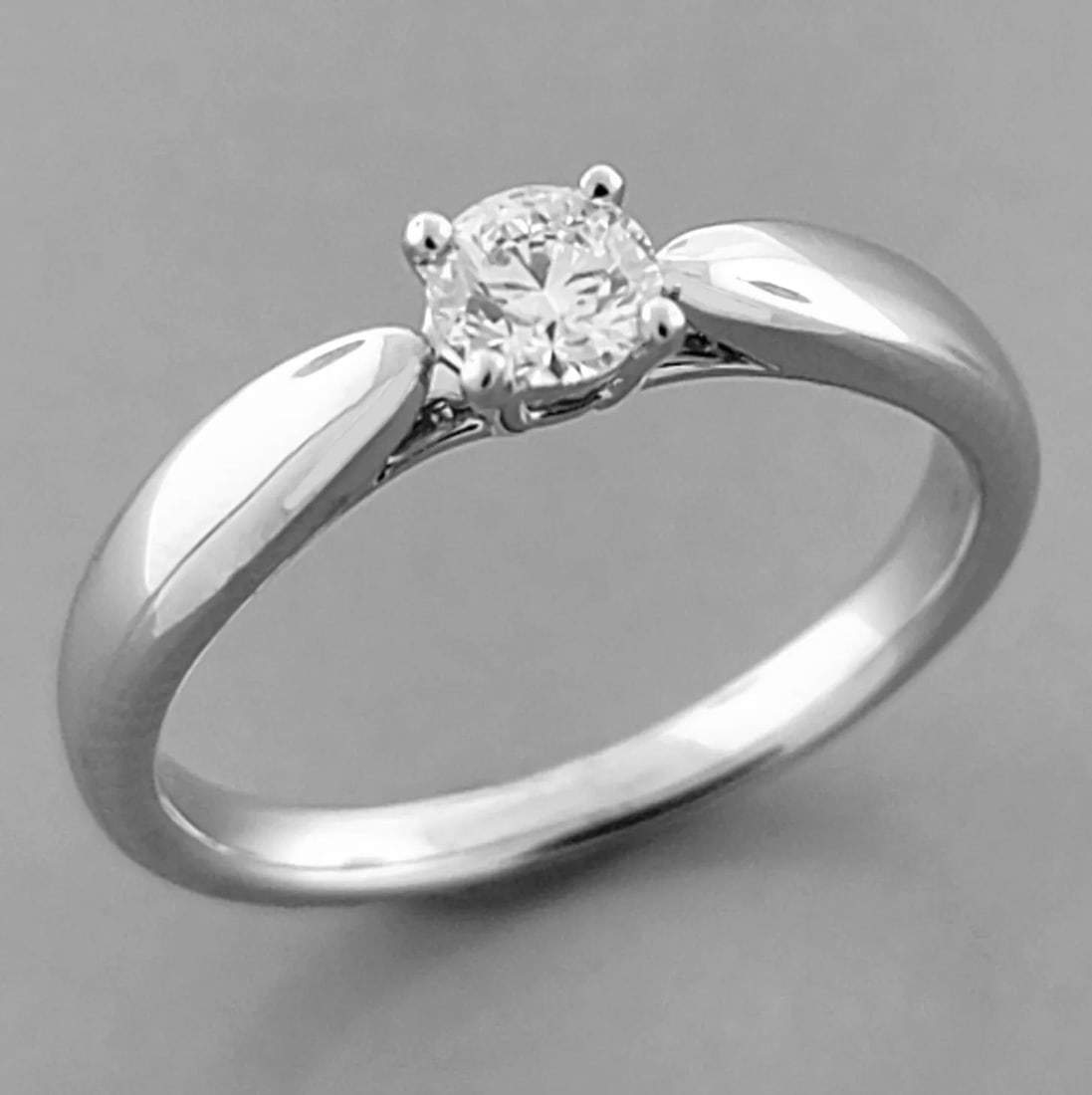 TIFFANY & Co. PLATINUM HARMONY 0.19ct DIAMOND ENGAGEMENT RING BOX PAPERWORK: TIFFANY & Co. PLATINUM DIAMOND ENGAGEMENT RING Ring size is a 3.25 (can easily be sized by your local jeweler) Tiffany & Co. Harmony platinum diamond engagement ring Diamond is 0.19ct Diamond quality