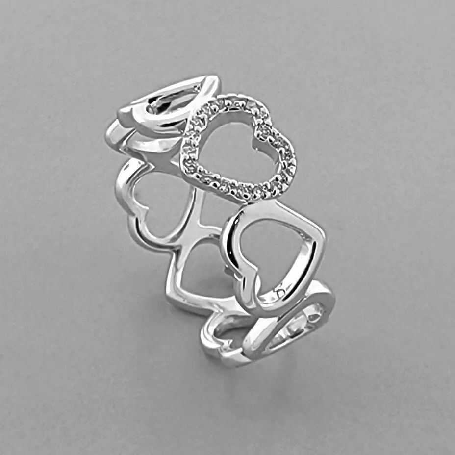 TIFFANY & Co. 18K WHITE GOLD DIAMOND HEART ETERNITY BAND RING SIZE 7: TIFFANY & Co. 18K GOLD BAND RING SIZE 7 Ring size is a 7 Ring measures 7.5mm wide Tiffany & Co. 18K white gold diamond heart band ring Pre-owned in Excellent condition, please refer to pics Stamped -