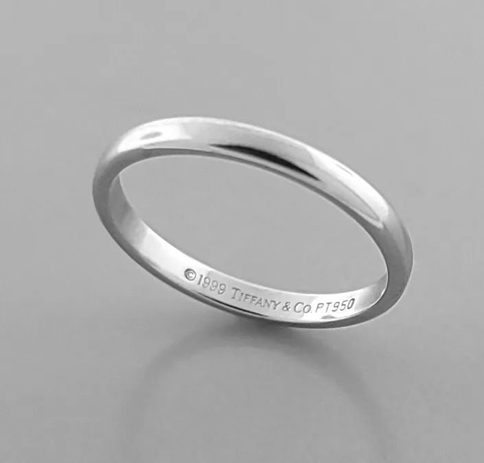 TIFFANY & Co. 2mm LUCIDA PLATINUM WEDDING STACKING RING BAND SIZE 5: TIFFANY & Co. WEDDING BAND RING SIZE 5 Ring size is a 5 Ring measures 2mm wide 1mm Thick/High Tiffany & Co. Platinum wedding band Pre-owned in Excellent condition, please refer to pics Stamped - 1999