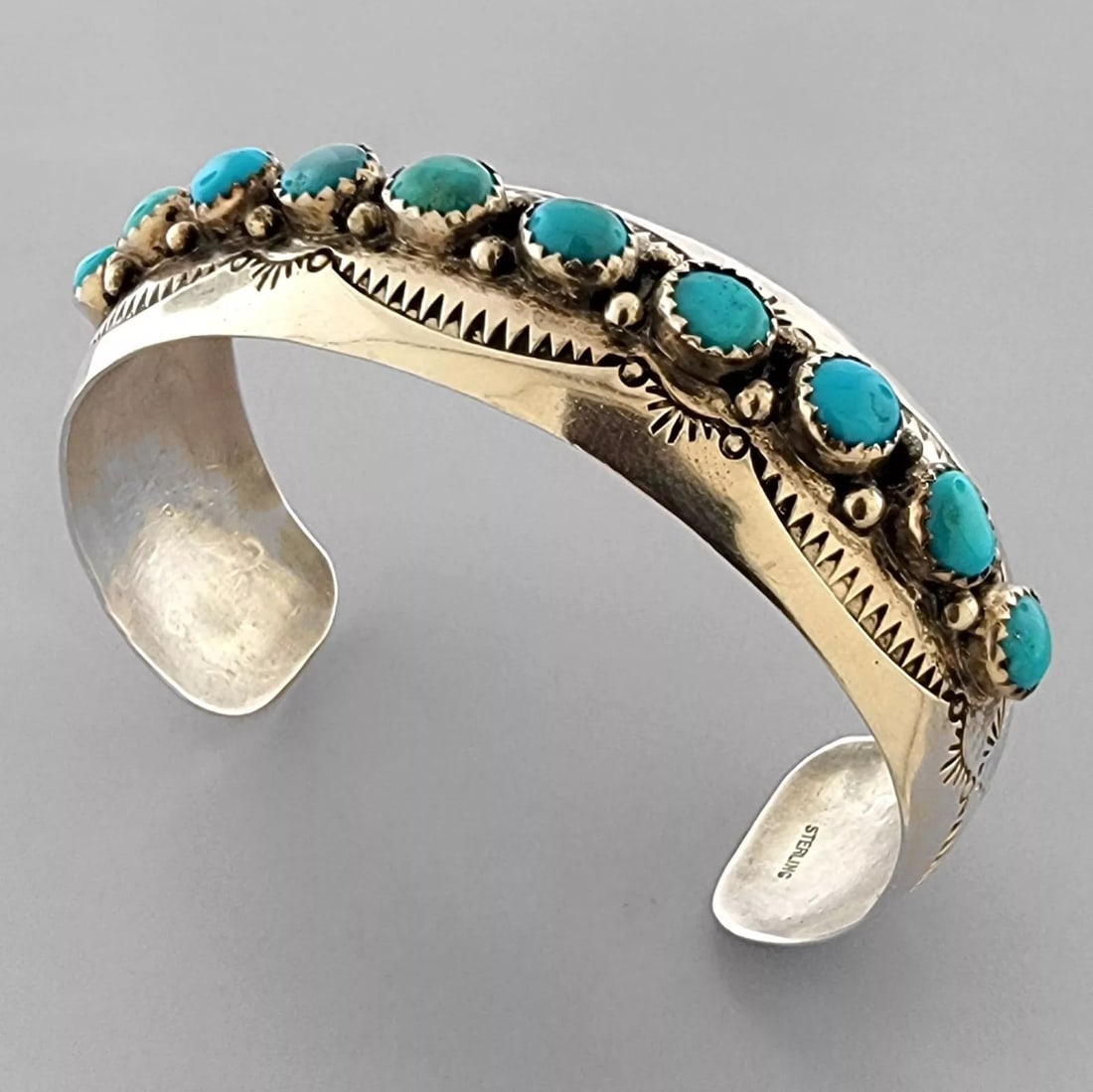 VINTAGE NAVAJO STERLING SILVER LARGE TURQUOISE CUFF BANGLE: VINTAGE TURQUOISE STERLING SILVER CUFF Vintage Navajo Turquoise sterling silver cuff bangle Measures 2.57" inside measurement Measures 0.75" Wide Vintage, Pre-owned, in good condition for its age, ple