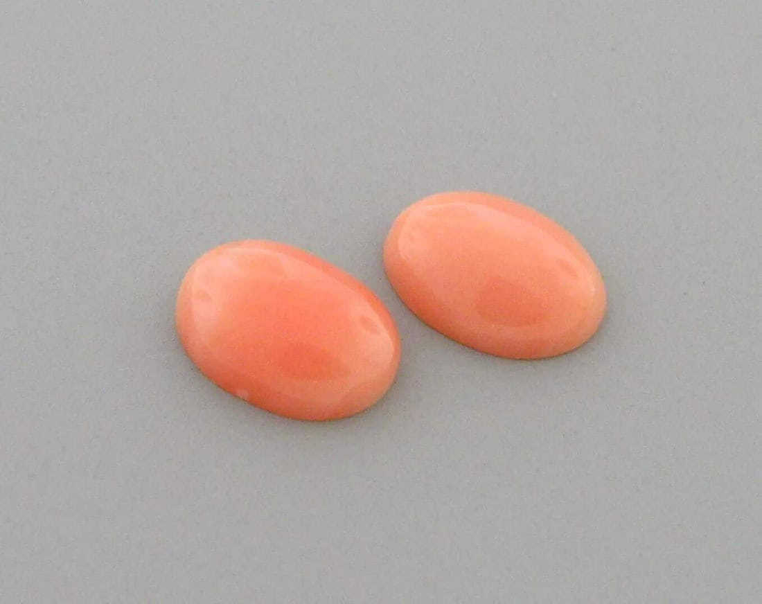 NATURAL UNTREATED 8x6mm SEA CORAL OVAL SHAPE PINK SALMON CABOCHON MATCHING PAIR: NATURAL UNTREATED 8x6mm SEA CORAL OVAL SHAPE PINK SALMON CABOCHON MATCHING PAIR LOOSE NATURAL UNTREATED OVAL CABOCHON CORAL Coral measures apx 8x6mm Sale is for a matching pair Natural untreated sea c