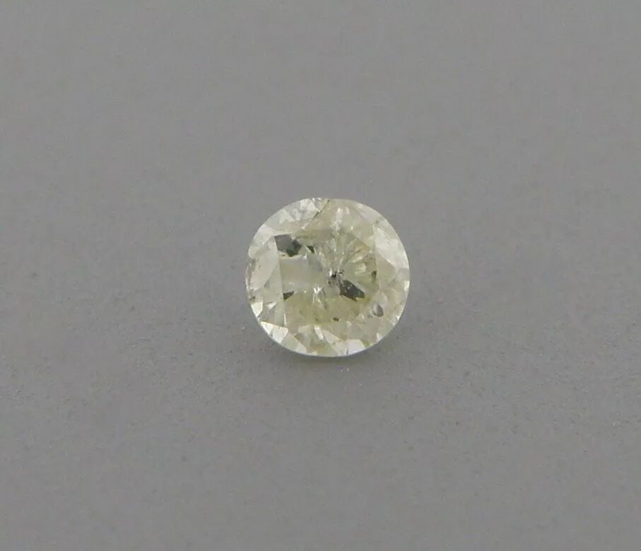 0.13ct LIGHT FANCY YELLOW DIAMOND ROUND CUT UNTREATED (1 of 2)