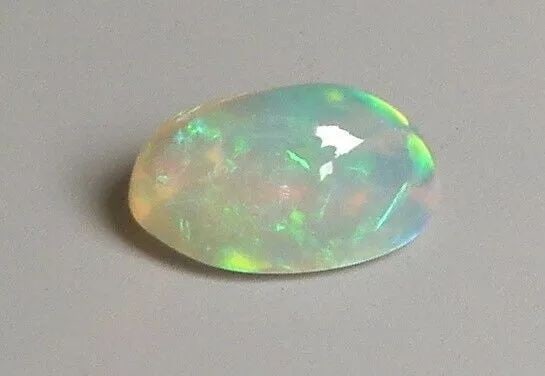 1.57ct AFRICAN CLEAR OPAL OVAL CABOCHON CUT NATURAL RARE BEAUTIFUL COLOR PLAY (1 of 2)