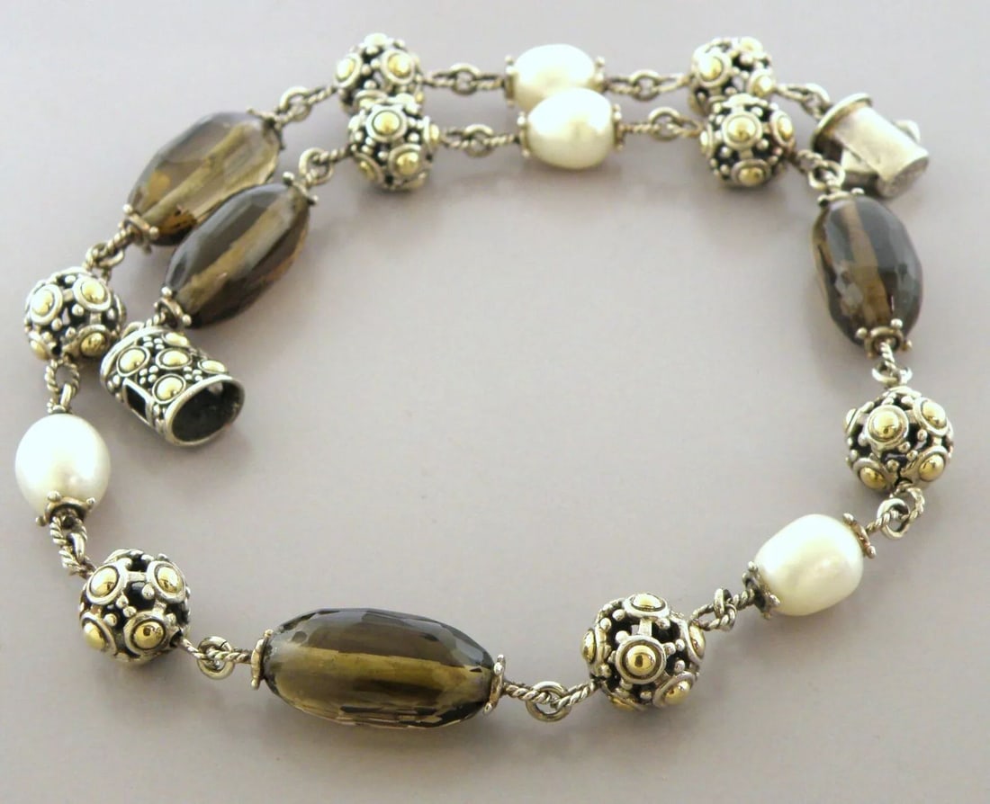 JOHN HARDY 18K GOLD STERLING SILVER JAISALMER QUARTZ PERAL NECKLACE: TIFFANY & Co. STERLING SILVER CUFFLINKS Cufflinks Face measures 0.58" W x 0.51" H Tiffany & Co. Sterling silver briefcase cufflinks Pre-owned, in good condition, please refer to pics Stamped TIFFANY &