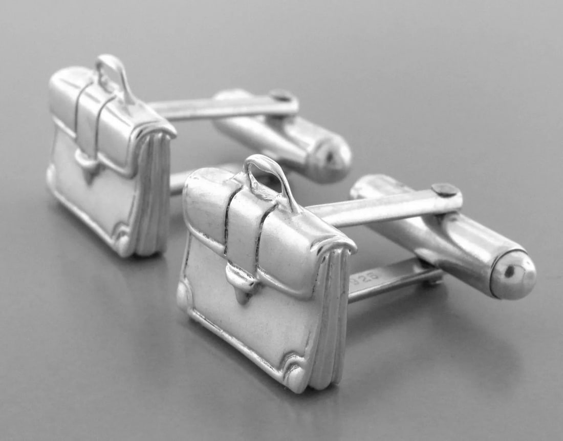 TIFFANY & Co. STERLING SILVER BRIEFCASE CUFFLINKS POUCH INCLUDED: JOHN HARDY STERLING SILVER HOOP EARRINGS Earrings measure 1.5" in diameter x 0.20" Wide John Hardy black sapphire sterling silver hoop earrings Pre-owned in good condition, please refer to pics Butter