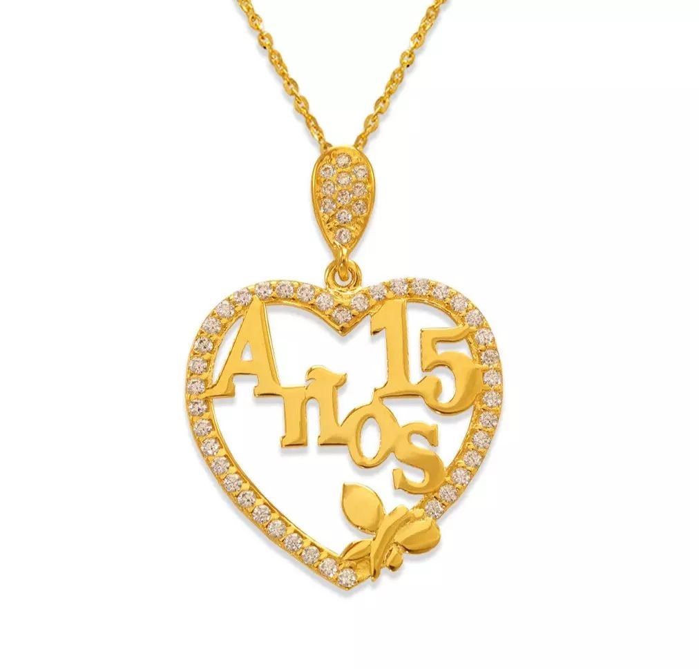 NEW 14K YELLOW GOLD FANCY 15 ANOS CZ PENDANT: NEW 14K YELLOW GOLD FANCY 15 ANOS CZ PENDANT 14K Yellow Gold Approx. 21x30mm High Polished/Cubic Zirconia Chains Sold Separately Weight: 1.9 Grams