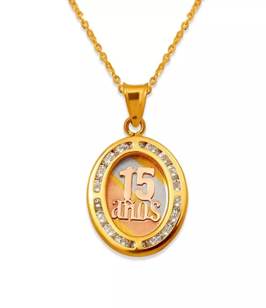 NEW 14K TRICOLOR GOLD 15 ANOS CZ PENDANT: NEW 14K TRICOLOR GOLD 15 ANOS CZ PENDANT 14K Tricolor Gold Approx. 13x16mm Cubic Zirconia Chains Sold Separately Weight: 1.0 Grams