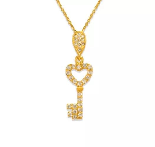 NEW 14K YELLOW GOLD FANCY HEART KEY CZ PENDANT: NEW 14K YELLOW GOLD FANCY HEART KEY CZ PENDANT 14K Yellow Gold Approx. 8x19mm High Polished/Cubic Zirconia Available in Rose and White Gold Chains Sold Separately Weight: 1.2 Grams