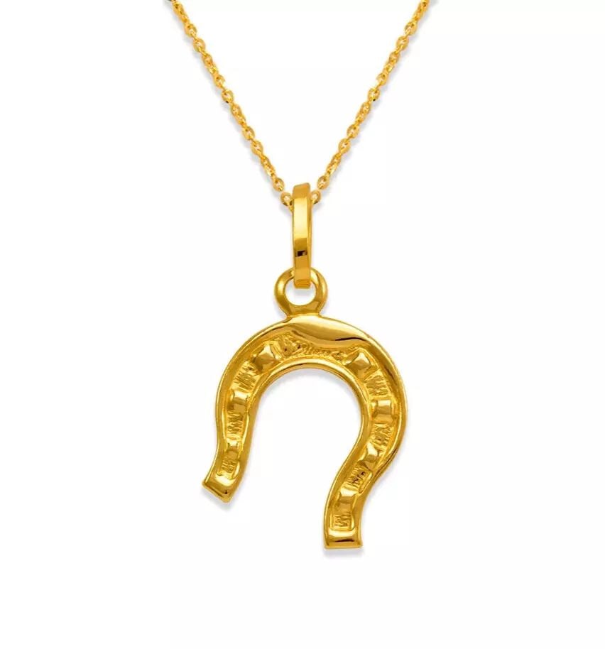 NEW 14K YELLOW GOLD HORSESHOE CHARM PENDANT: NEW 14K YELLOW GOLD HORSESHOE CHARM PENDANT 14K Yellow Gold Approx. 9x11mm Hollow Chains Sold Separately Weight: 0.6 Grams