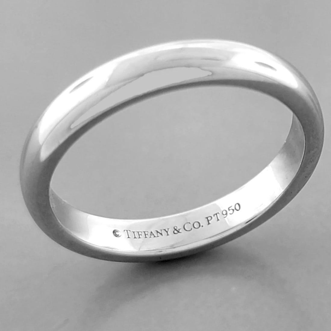 TIFFANY & Co. 3mm FOREVER PLATINUM LUCIDA WEDDING BAND RING: TIFFANY & Co. FOREVER WEDDING BAND RING Ring size is a 5 Ring measures 3mm wide 1.6mm Thick/High Tiffany & Co. Forever Platinum Lucida wedding band Pre-owned in Excellent condition, please refer to pi