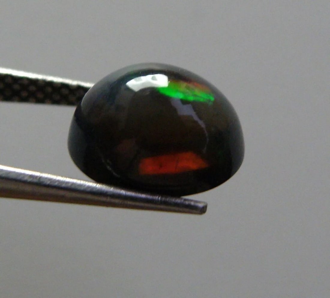 1.31ct AFRICAN BLACK OPAL OVAL CABOCHON CUT NATURAL UNTREATED RARE (1 of 2)